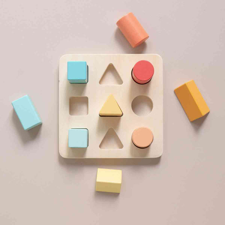 Shape sorter puzzle with squares, triangles and circles