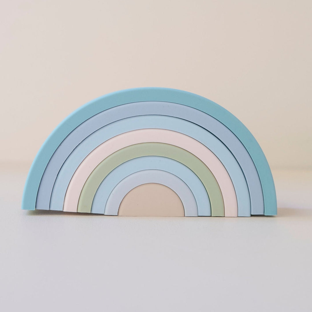 Silicone Rainbow stacking game in blue, pink and green