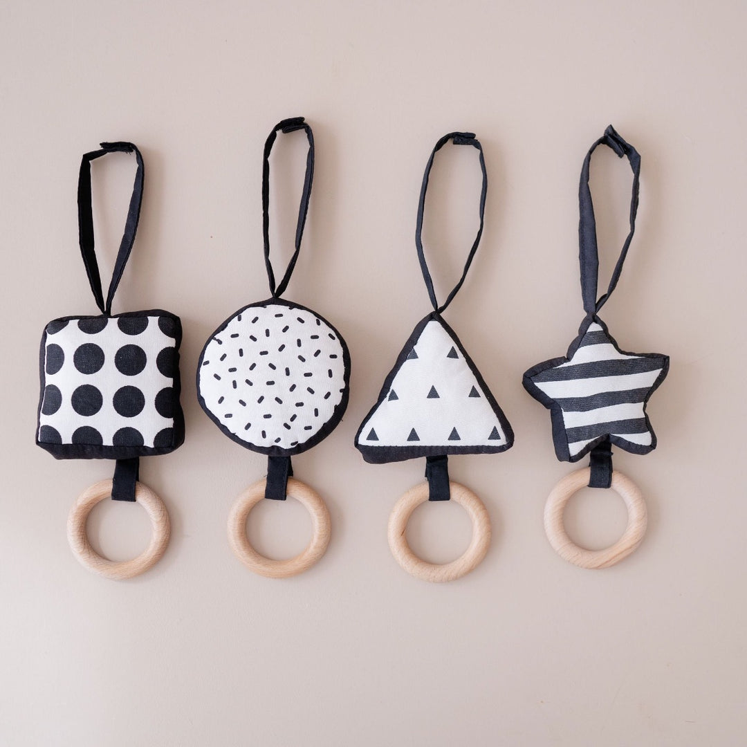 Black and White activity gym pendants with bold patterns