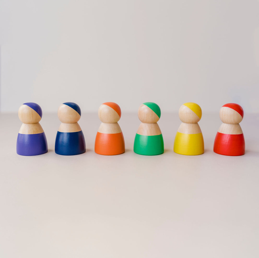 Wooden Rainbow People imaginative play toy.